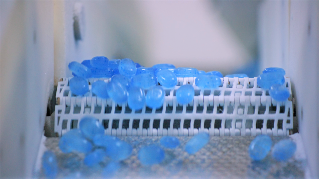 lozenges on conveyor belt 